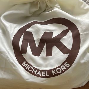 Michael Kors black handbag, medium sized. Gold chain strap, in good condition.